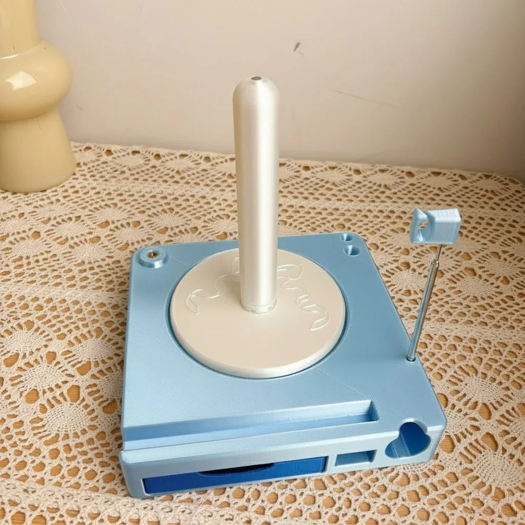 Light blue and white plastic golf ball dispenser on lace tablecloth, tabletop organizer
